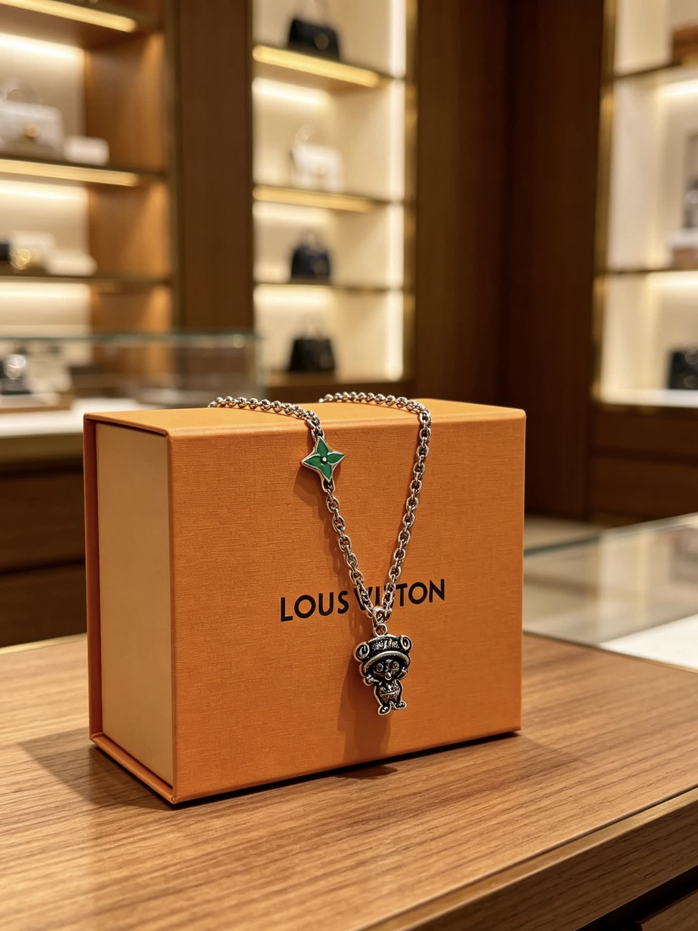 Louis Vuitton Silver Tone Necklace with Green Enamel and Monogram Bear Charm